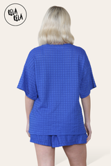 Back view of royal blue knitted co-ord set with T-shirt and shorts