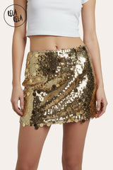 Gold shimmering mid rise disc sequin micro skirt front view – sparkly mini skirt with statement shine.