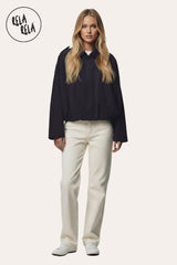 Front view of Model wearing in Black Faux Suede Bomber Jacket