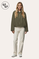 Front view of Model wearing in Khaki faux suede bomber jacket for women, smooth soft texture with zip-up front.