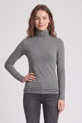 Front model view of the RELA RELA grey slim fit roll neck long sleeve layering top.