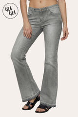 Front view of the viral stretchy bootcut flared jeans in Grey, showcasing the flap pocket detail and Y2K low-waisted fit on a petite model.