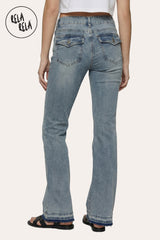 back view of the viral stretchy bootcut flared jeans in Vintage Blue on a petite model, showcasing the authentic washed indigo and Y2K low-rise fit.