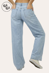 Back view of the viral stretchy fabric on light blue wide leg jeans, highlighting the flexible and comfortable premium denim.