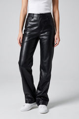 Front model view of RELA RELA Black high waist faux leather straight leg trousers, showing the wide-leg fit and glossy PU leather finish.