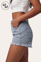 Additional angle of RELA RELA's Light Blue frayed hem denim shorts showing the sculpted stretch fit.