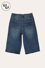 Professional flat lay of the back of the denim blue longline jorts