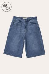 Flat Lay of The relaxed profile and over-the-knee length of the baggy Denim Blue shorts