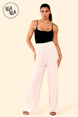 Beige plissé wide leg trousers front view – classic pleated trouser pants with flowing silhouette.