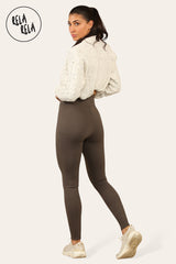 Back view of ladies thermal leggings in chocolate fleece lining