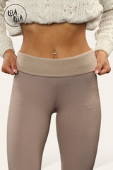 Detail of fleece lined interior fabric on warm taupe leggings for women
