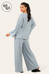 Back View of Long sleeve ribbed co ord set with matching trousers in blue.