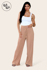 Tan plissé wide leg trousers front view – stylish pleated trouser pants with flowing silhouette.