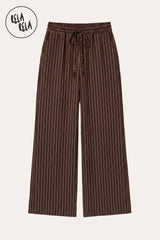 Flat lay of RELA RELA Chocolate pinstripe trousers, showing the soft tonal pinstripe weave on warm cocoa ground, elastic waistband and relaxed wide-leg silhouette on a clean white background.