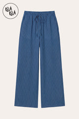 Flat lay of RELA RELA Navy pinstripe trousers, showing the soft tonal pinstripe weave on rich midnight ground, elastic waistband and relaxed wide-leg silhouette on a clean white background.