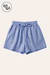 Flat lay of the Rela Rela Blue vertical striped flowy loungewear shorts with elastic waistband and two side pockets, showcasing the breathable faux linen texture and timeless stripe design.