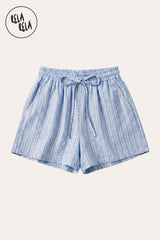 Flat lay of the Rela Rela Baby Blue vertical striped flowy loungewear shorts with elastic waistband and two side pockets, showcasing the breathable faux linen texture and timeless stripe design.