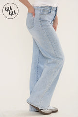 side view of Women's sparkling jeans with side diamante detail and glitter finish