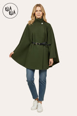 Model wearing khaki belted high neck poncho cape jacket paired with autumn outfit.
