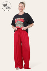 Red wide leg elasticated trousers for women with soft textured fabric
