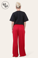 Back view of stylish red wide leg trousers with elasticated waistband