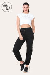 Front view of black stretch cuffed cargo pants with elastic waist