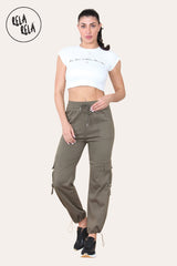 Model wearing in khaki cargo pants with utility pockets