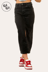 Front view of black stretchy denim maxi skirt with split front