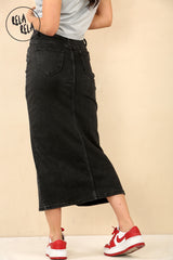 Back view of black stretchy denim maxi skirt with pencil fit