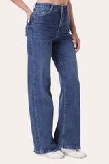 Side view of blue dad fit wide leg jeans, soft stretchy fabric
