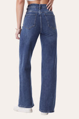 Back view of blue dad fit wide leg jeans with soft stretchy denim