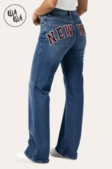 High waist blue denim jeans with embroidered New York detail – wide leg style