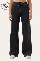 Front view showing the relaxed dad fit and wide leg silhouette of the charcoal stretchy mid-waist jeans.