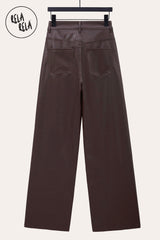Back view of chocolate wide leg faux leather trousers – stylish dad fit trousers with smooth finish.