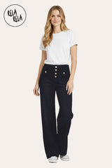 Model wearing in Stretchy Wide Leg Seamed Jeans in Black, styled with a casual top and sneakers.