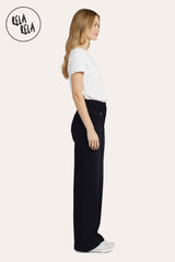 Side view of comfortable mid-waist dad fit wide leg seamed jeans in black, perfect for casual and streetwear looks.