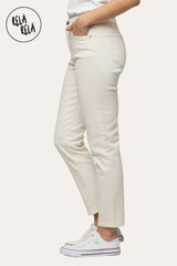 Side View of Cream stretch mom fit jeans for women