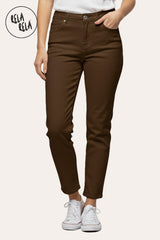 Model wearing Stretch Chocolate Mom Jeans – Mid Rise 