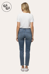 Back view of Women's denim blue mom jeans, mid-rise waist, relaxed yet flattering cut