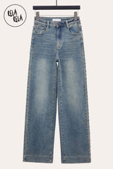 Front view of Stretchy Studded Rivet Wide Leg Jeans in Vintage Blue