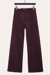 Front view of flare jeans with front seam, taupe colour, wide leg fit.