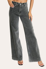 Front view of dark grey pintuck flare jeans – stretchy wide leg denim with front seam detail for a sleek, elongated look.