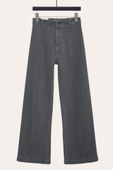 flat lay of front seam flare jeans in dark grey denim – detailed pintuck stitching adds structure and polish.