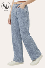 Side view of Model wearing in Blue Leopard Print Viral Stretchy Wide Leg Jeans