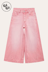 RELA RELA Pink baggy fit longline denim jorts flat lay front view on cream background, showing soft Pink wide-leg denim with silver metal button at the waistband, five belt loops, two front pockets with rivets, and zip fly closure