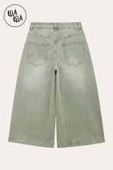 RELA RELA Sage baggy fit longline denim jorts flat lay back view on cream background, showing muted Sage green wide-leg denim with two patch back pockets and the below-knee longline hemline