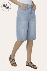 Side profile of the Light Blue loose cut denim shorts, showcasing the wide-leg profile and the flattering longline length.
