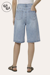 Rear view of the Baggy Fit denim shorts, demonstrating the high-waisted fit and the premium washed indigo denim texture.