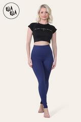 Model stretching in navy sculpting leggings for gym