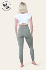 Back view of high waisted gym leggings in olive green colour